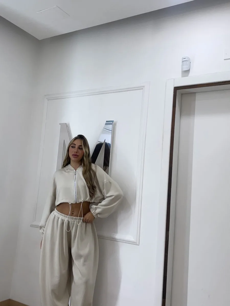 Tuta regolabile crema